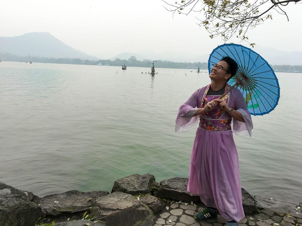 The Travel Intern – Kenneth dressed up in a traditional Chinese costume by the West Lake, Hangzhou