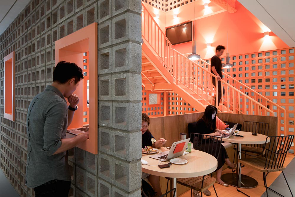 People having lunch at Airbnb's Singapore Office