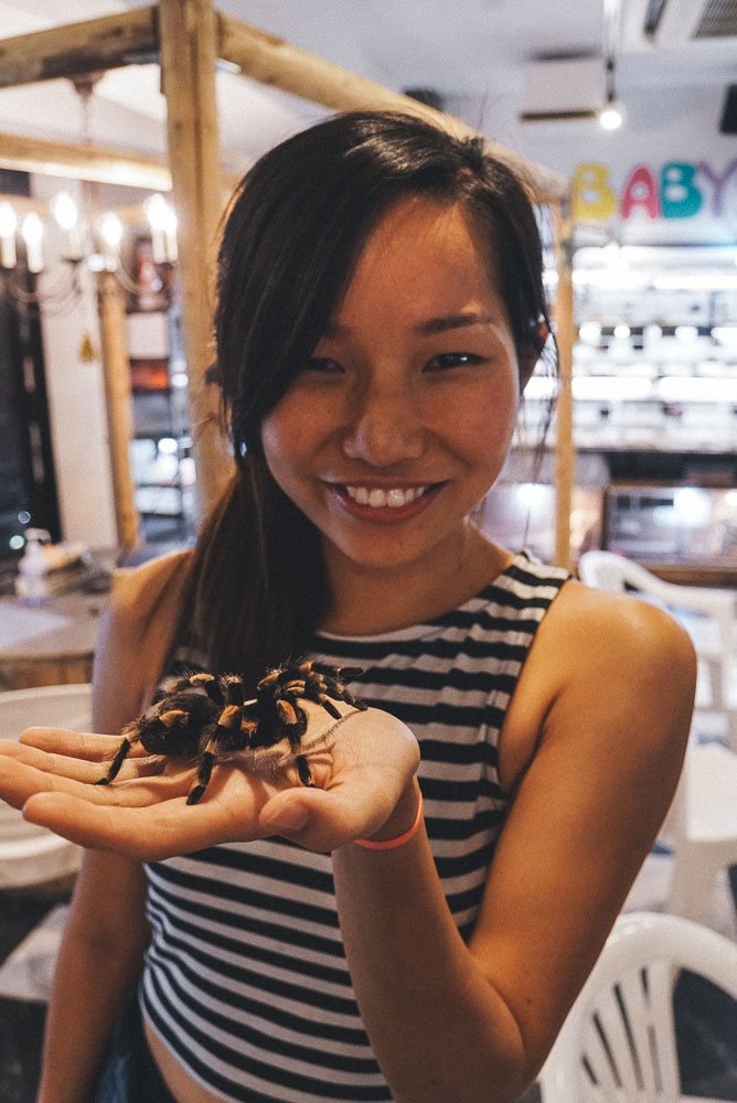 Cherie holding a tarantula at Rockstar Cafe - Reptile Cafe Osaka