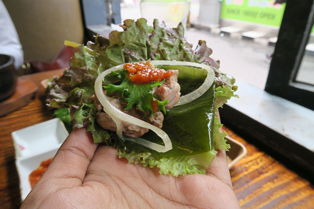 Korean BBQ meat in lettuce wrap - Food in Seoul