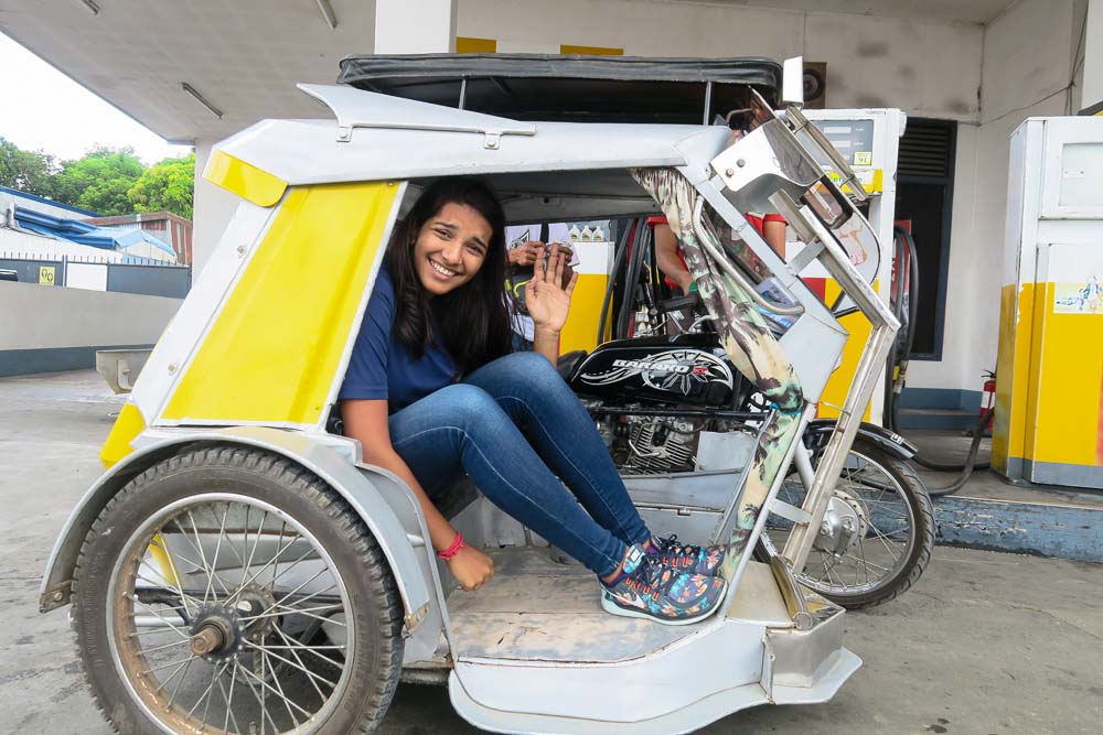 Sara in a tricycle - Things to know before travelling to the Philippines transport