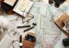 World map flat lay - Travel budget gap year