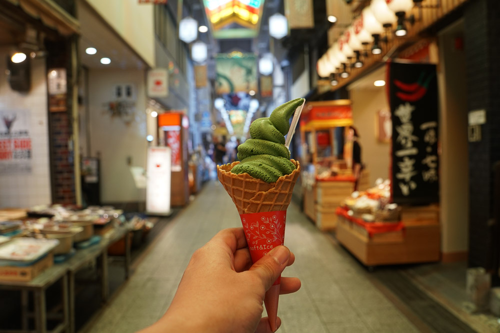 thick matcha soft serve in Nishiki market - Foods in Osaka and Kyoto