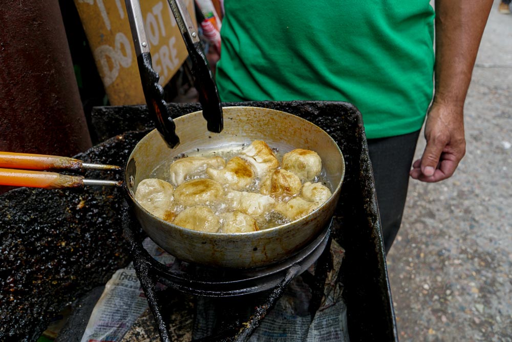 Momos frying on the streets in Dharamshala (McLeod Ganj)