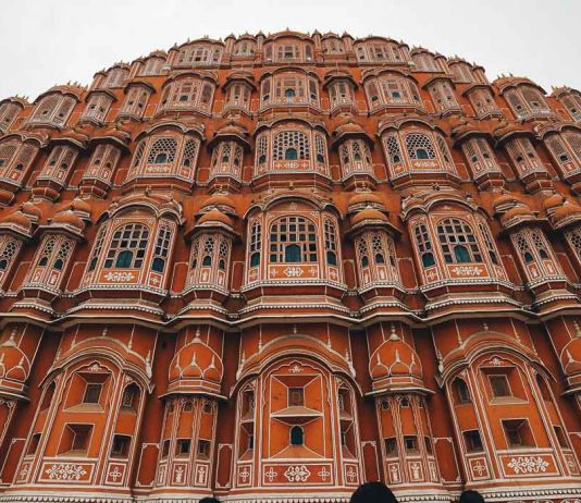 Jaipur Survival Guide: Experiencing Life in the Pink City 300 Years Ago Hawa Mahal taken with wide angle lens - Jaipur Survival Guide