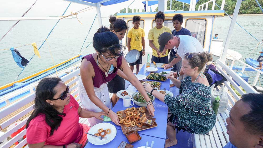 having-lunch-on-boat-tao-philippines-expedition