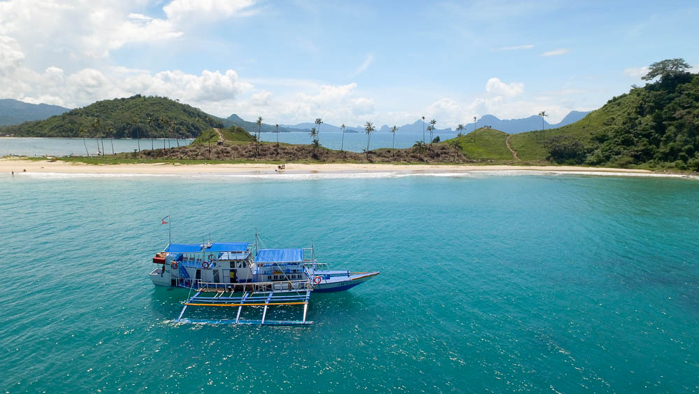 Nacpan-Island-with-boat-drone-Tao-Philippines-Expedition