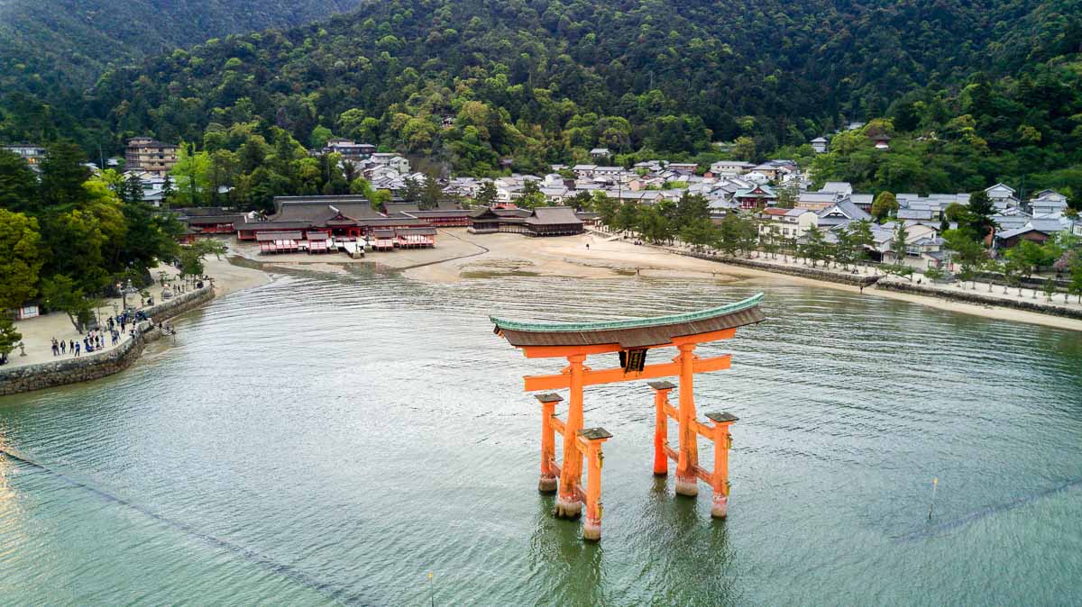 Miyajima tori gate standing on water - Kansai Hiroshima JR Pass Japan Budget Itinerary