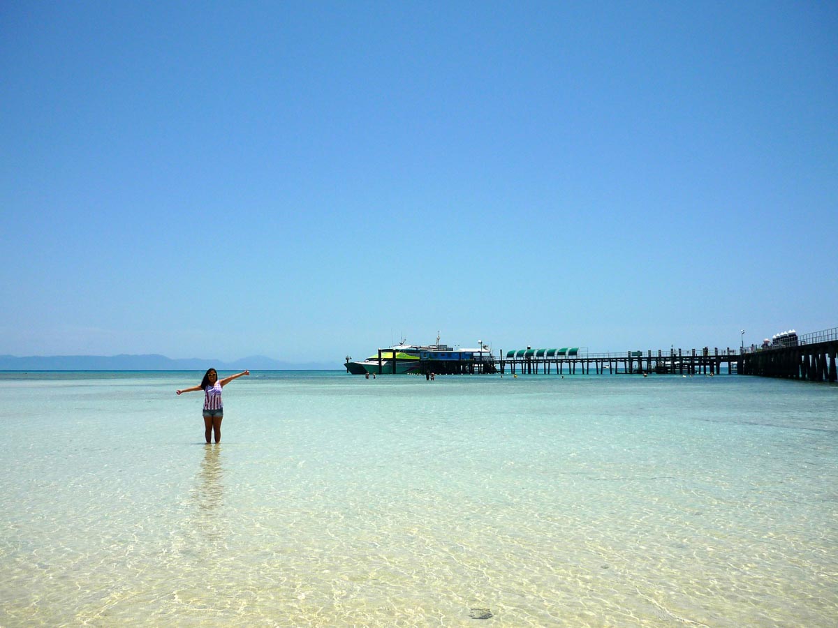 Standing in the middle of clear waters in Sydney