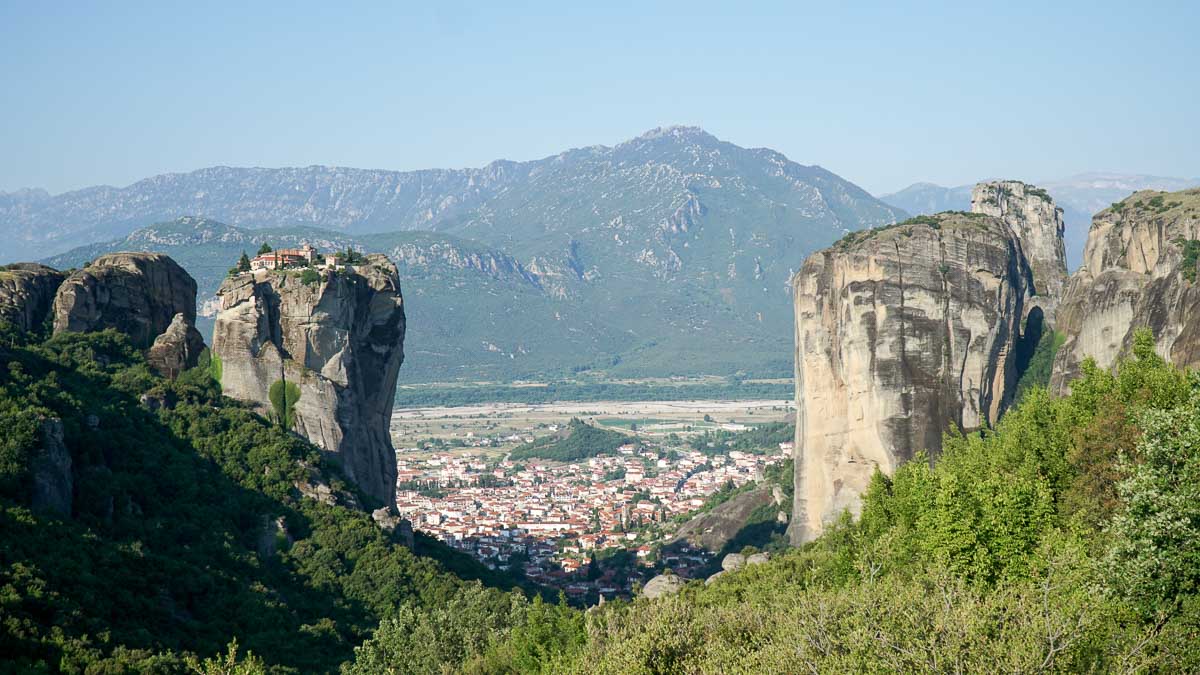 Sun lighting up Kalambaka in Meteora - Greece Budget Itinerary