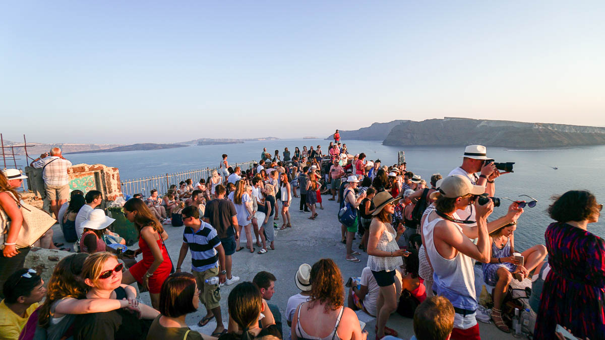 Crowd at Oia during sunset in Santorini - Greece Budget Itinerary