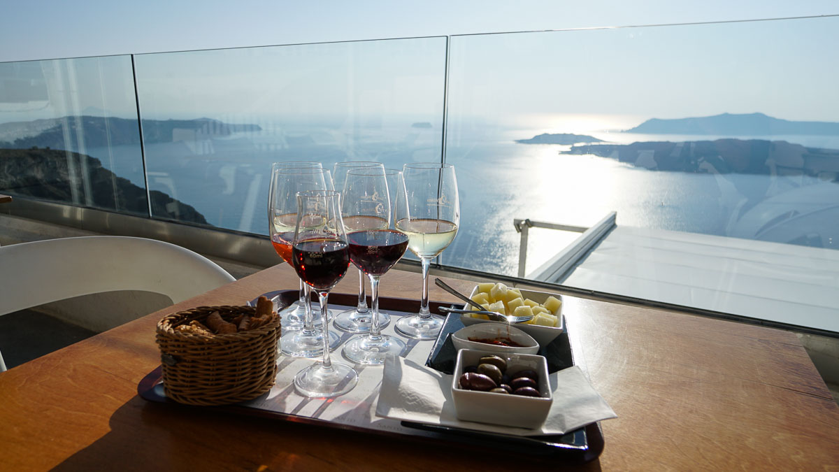 Wine tasting with a view at Santos Wines Santorini - Greece Budget Itinerary