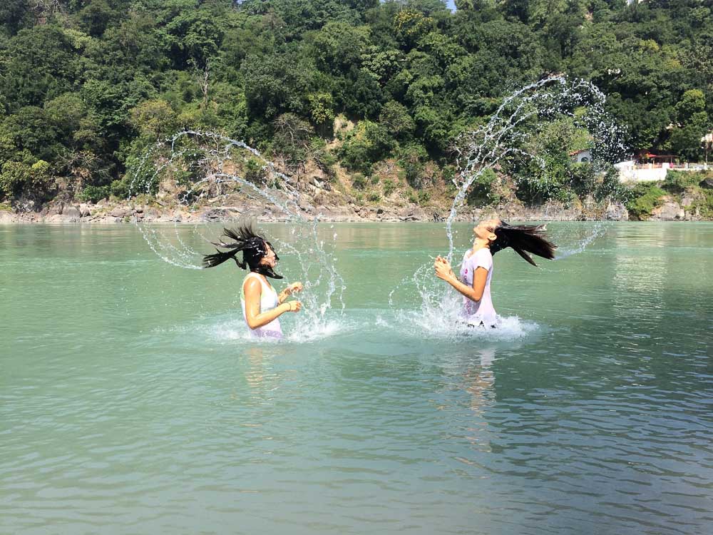 Dipping in the Ganges in rishikesh - India