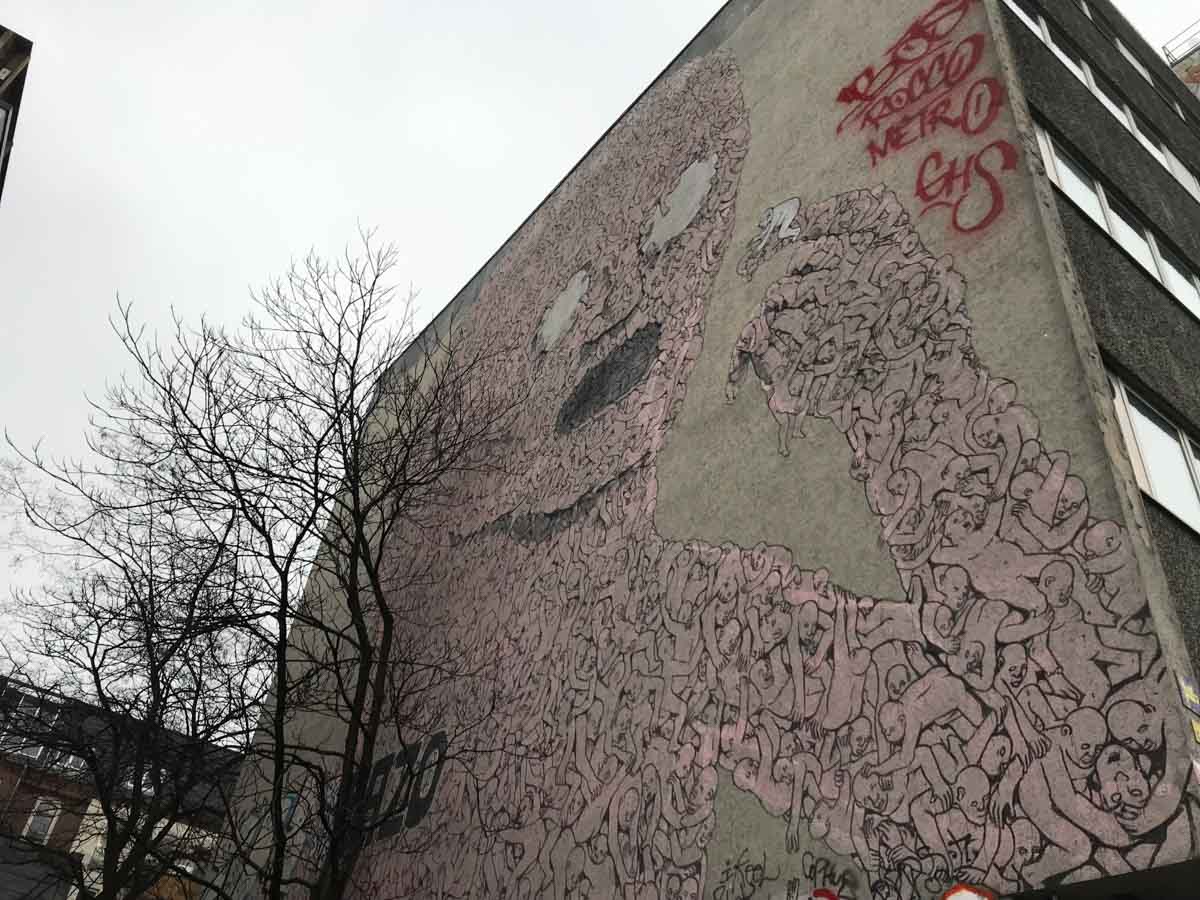 Alternative City Walking Tour at the Pink Man Mural - Budget Berlin Travel Guide