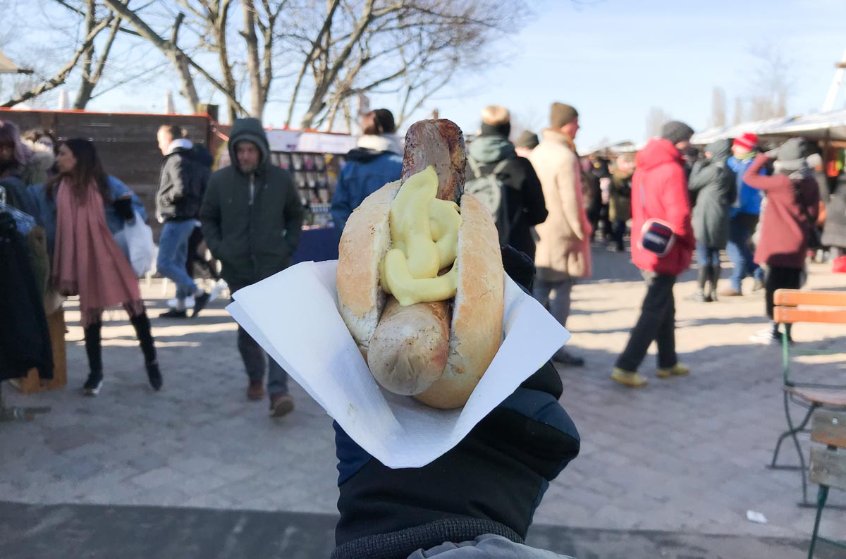 Bratwurst Street Food at Mauerpark on Sunday - Budget Berlin Travel Guide