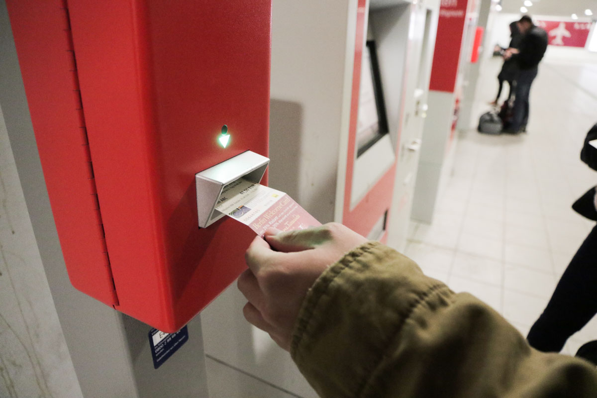 Ticket Validating Machine at a Train Station in Berlin - Budget Berlin Travel Guide
