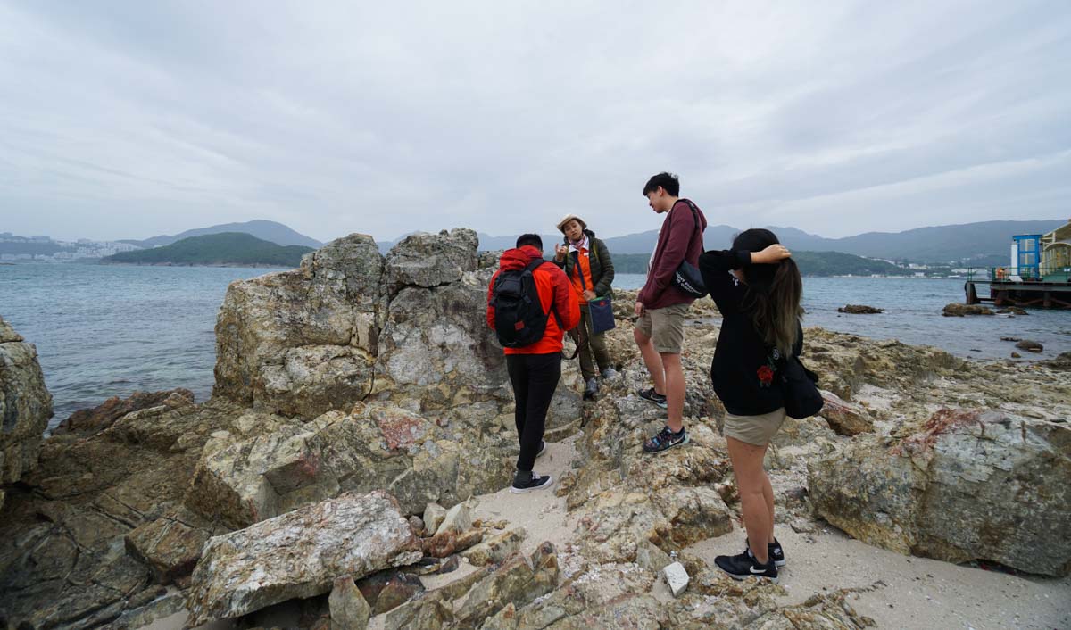 Geopark Guide Explaining the Volcanic Rock Formations on Sharp Island - Lesser-Known Sights in Hong Kong