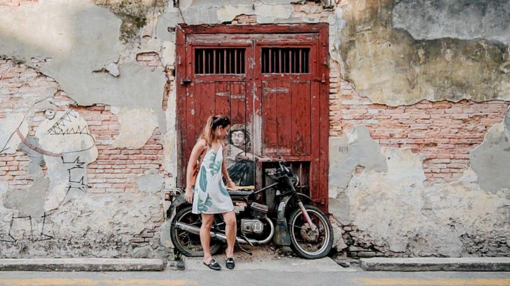 Boy on a bike street art penang - Short Getaways from Singapore