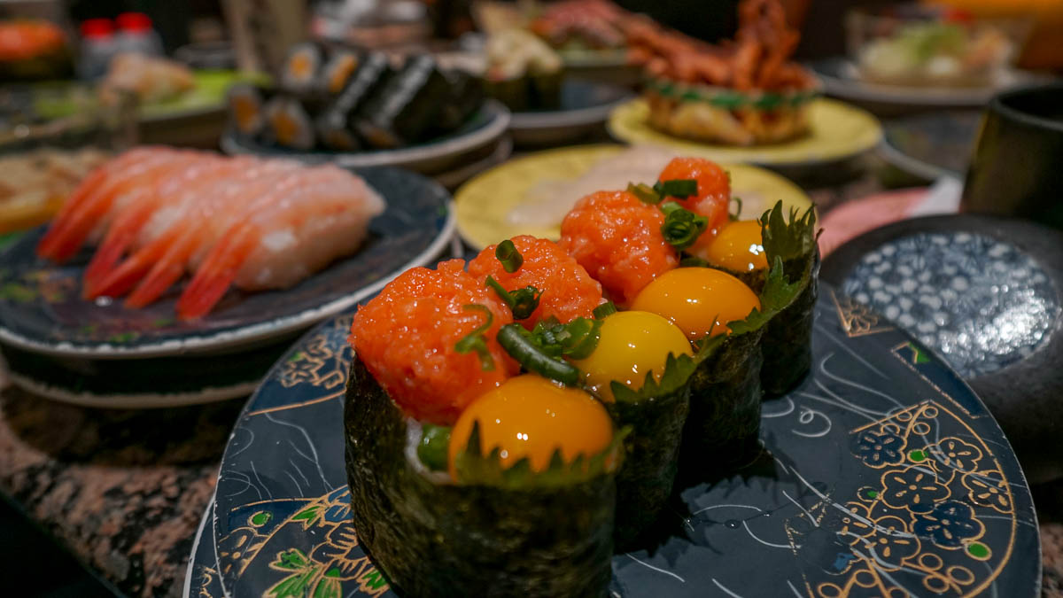 Hanamaru quail eggg salmon sushi - Budget Hokkaido Itinerary