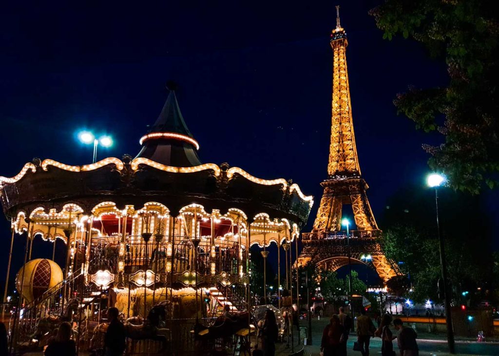 Night view of eiffel tower and carousel Paris - France Budget Itinerary
