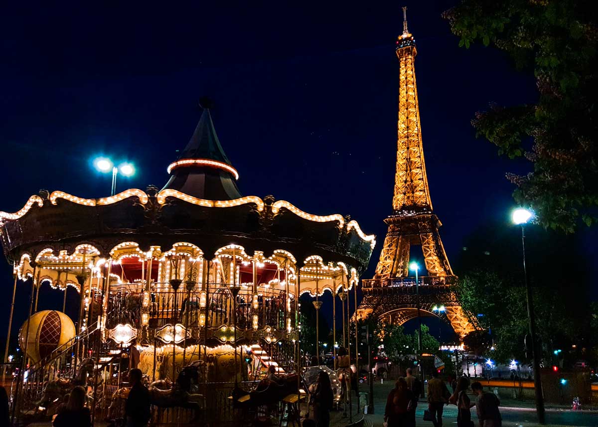 Night view of eiffel tower and carousel Paris - France Itinerary