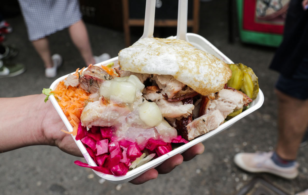 Pork Lunch Box at Brick Lane Market in London - Scotland Wales London Itinerary BritRail Pass