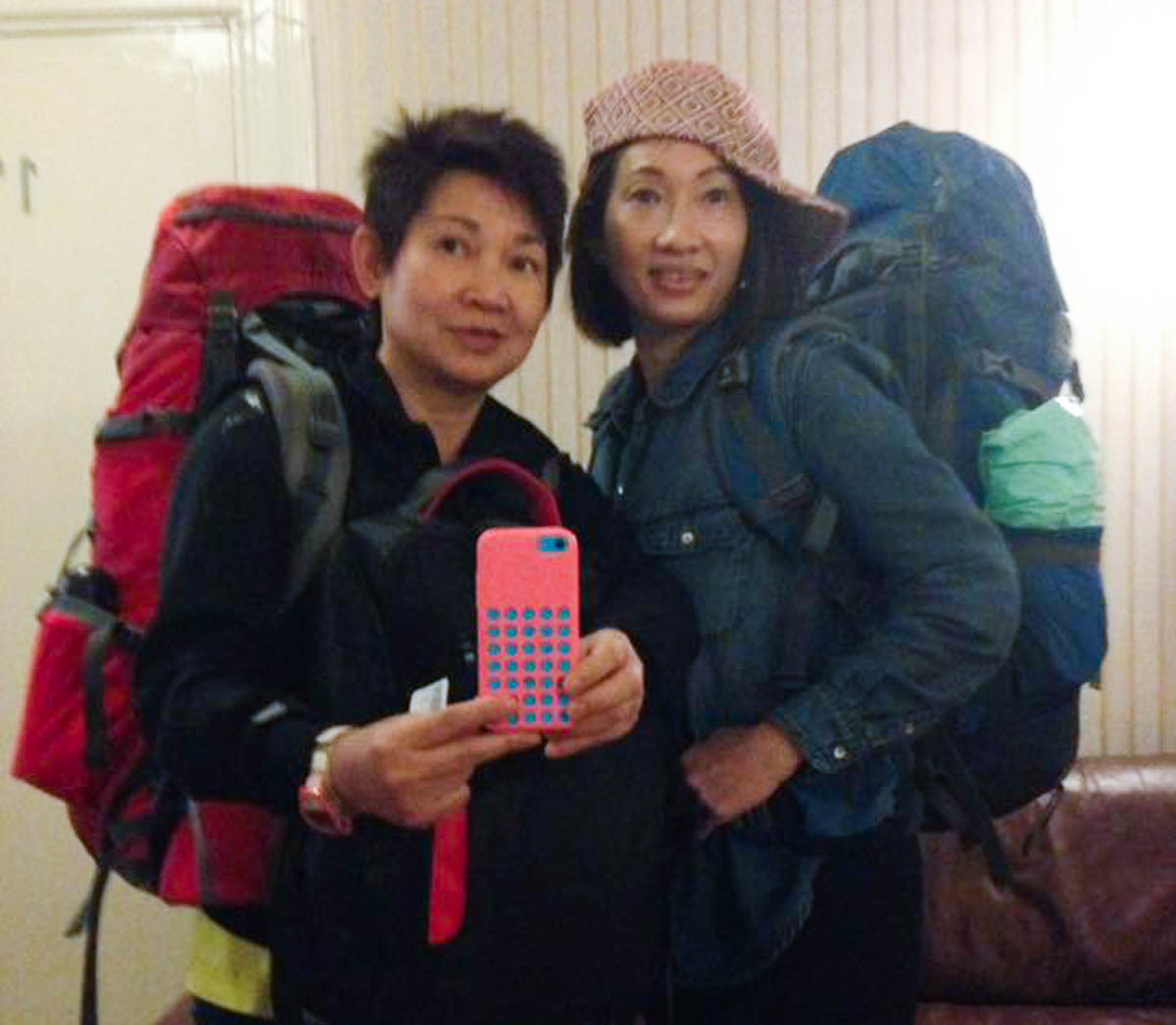 Merine Chung with her sister carrying their backpacks - 58-year-old Singaporean Solo Backpacker