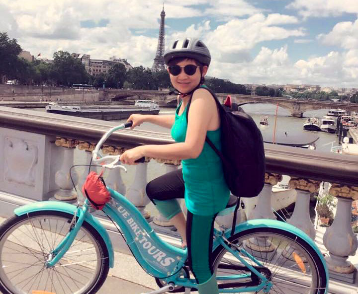 Merine on a Bicycle Tour in Paris - 58-year-old Singaporean Solo Backpacker