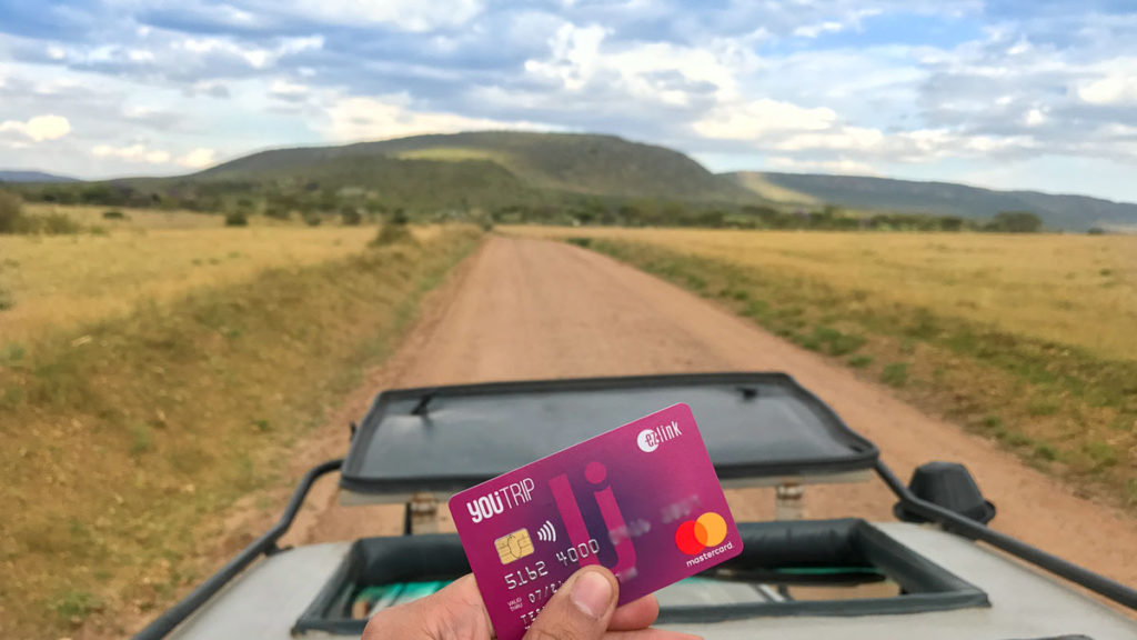 Holding the YouTrip Card in Maasai Mara Kenya--YouTrip Review 3