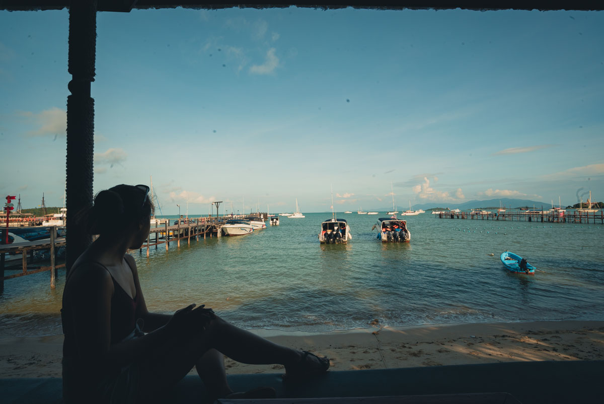 Sitting by the pier waiting for our day tour - Koh Samui Itinerary Luxurious Adventure