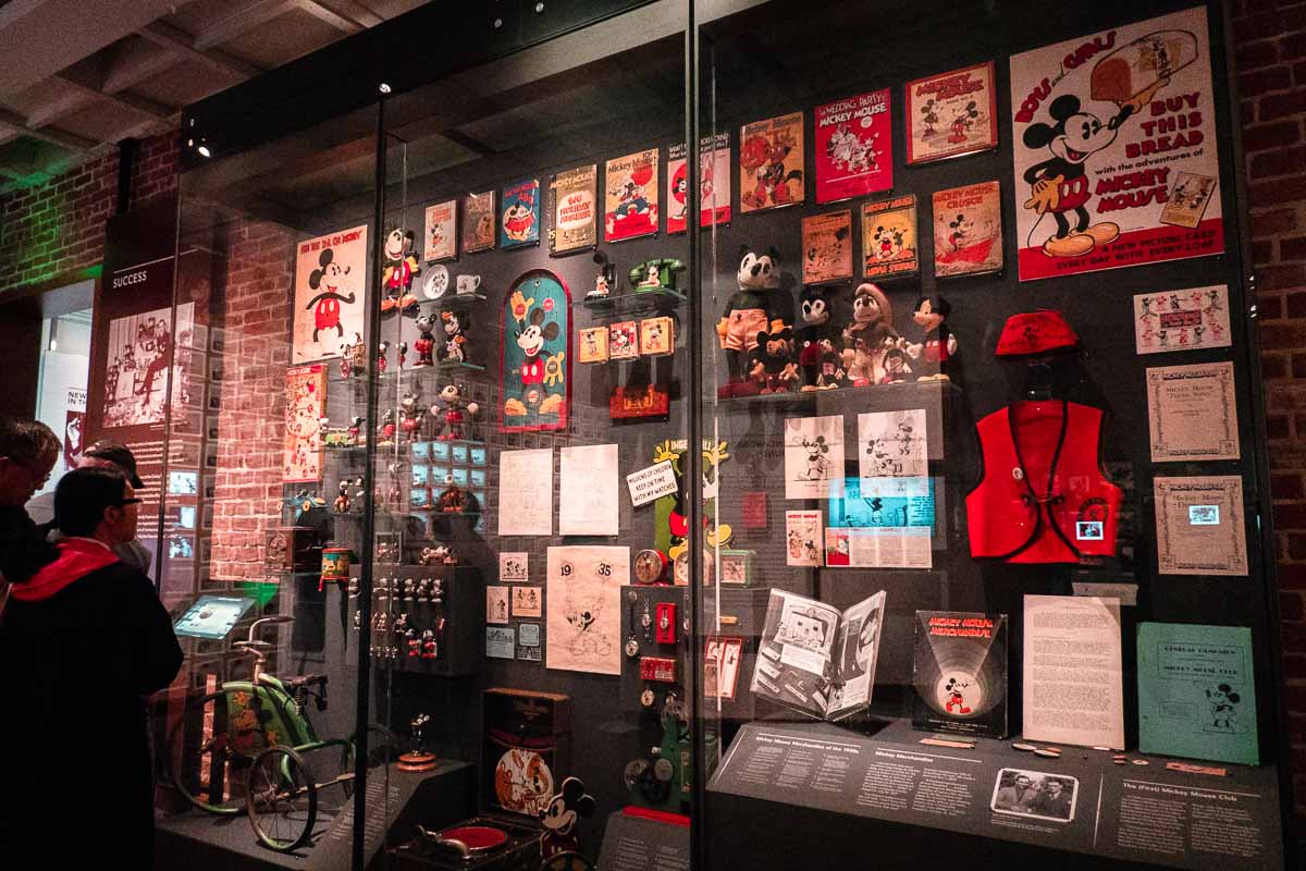 Looking at Mickey Mouse Memorabilia at Walt Disney Family Museum - SF to LA Road Trip Itinerary
