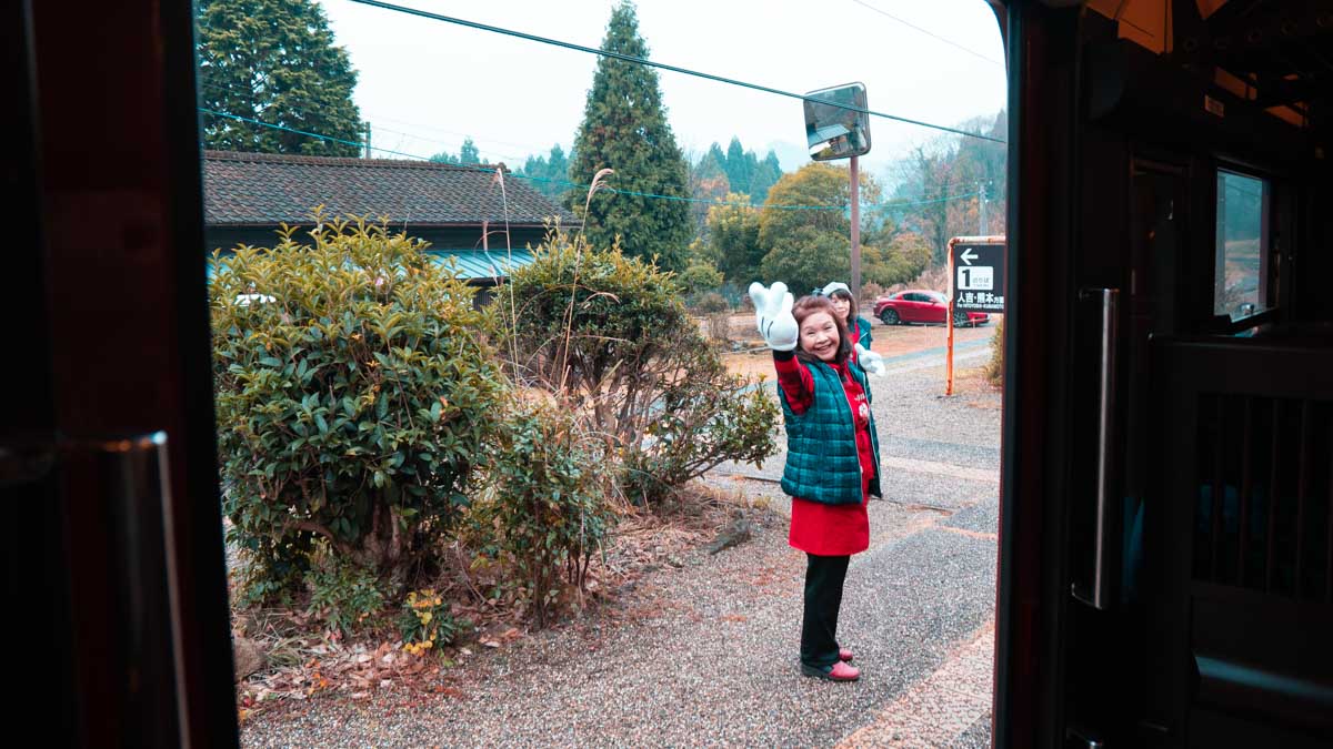 Staff waving Scenic train to kagoshima - Japan Kyushu Itinerary-6