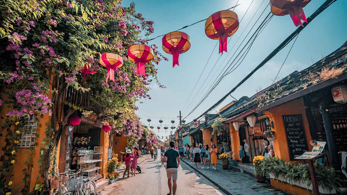 A man walking through Hoi An Streets - Central Vietnam Itinerary