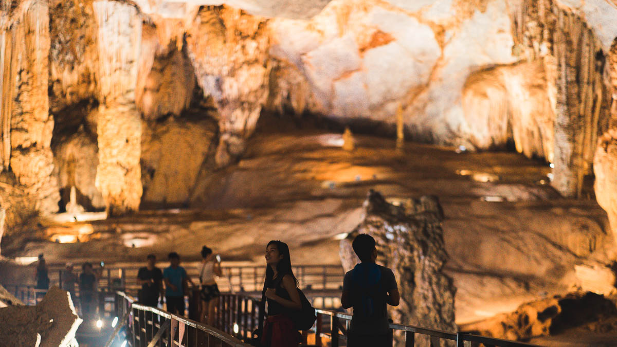 People standing on bridge in Phong Nha Cave 3 - Central Vietnam Itinerary