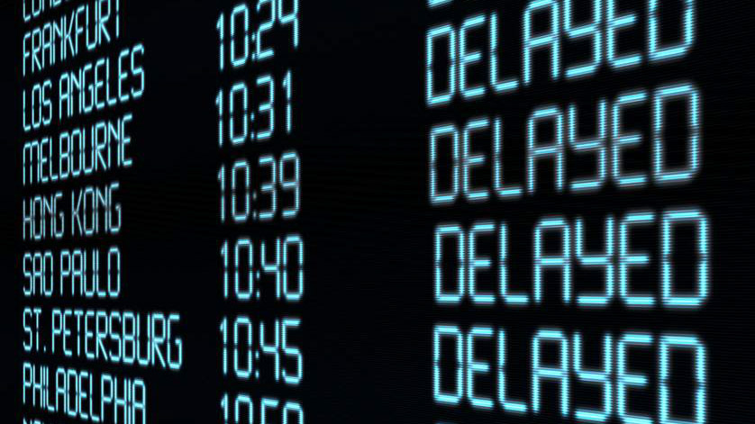 Flight delays display in airport - DirectAsia Travel Insurance Review