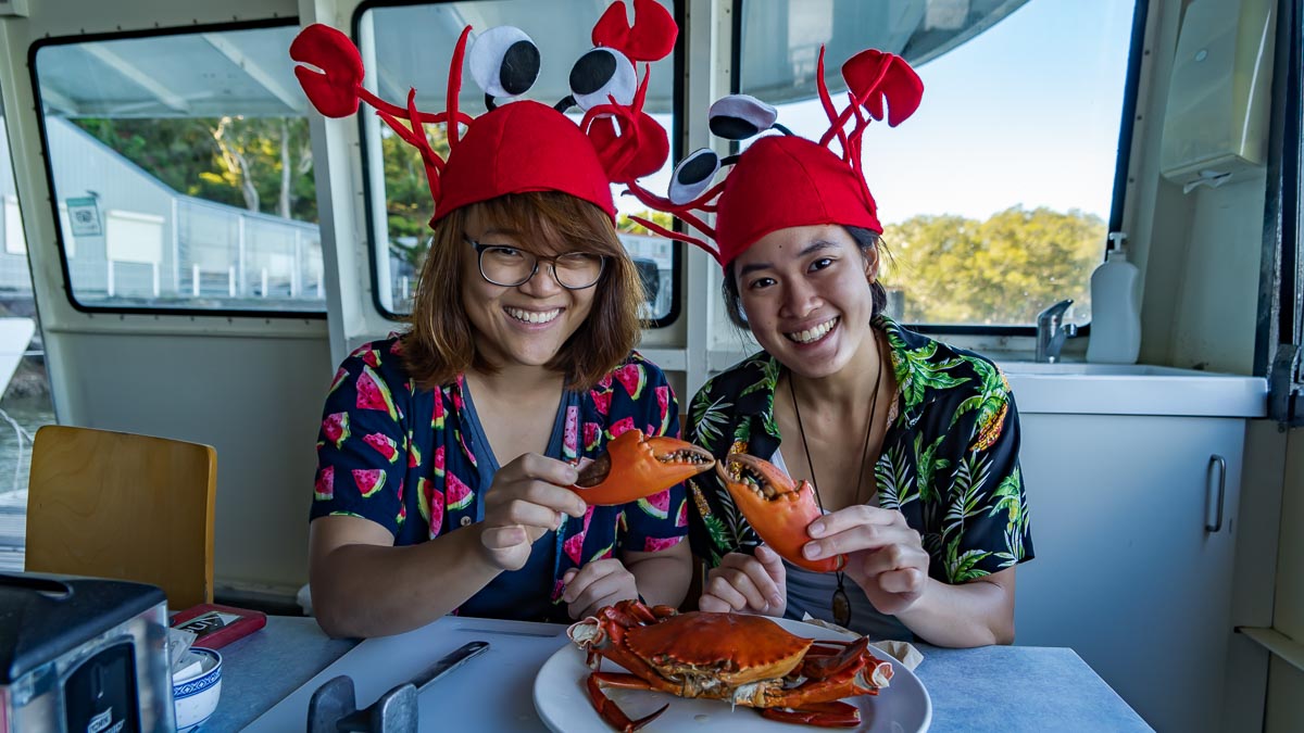 Eating crabs on Catch a Crab Tour - Australia Road Trip