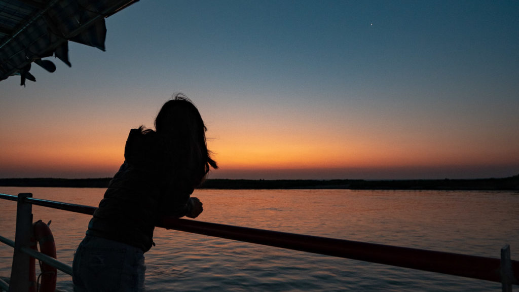 Myanmar Boat at Sunrise - Backpack Southeast Asia Travel Guide