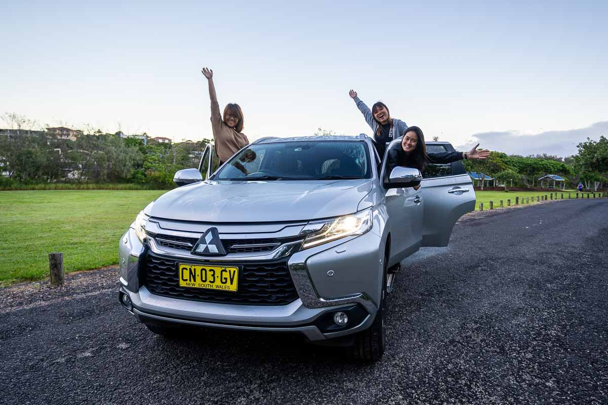 Posing with our Bryon Bay Road Trip Car - Byron Bay NSW Itinerary