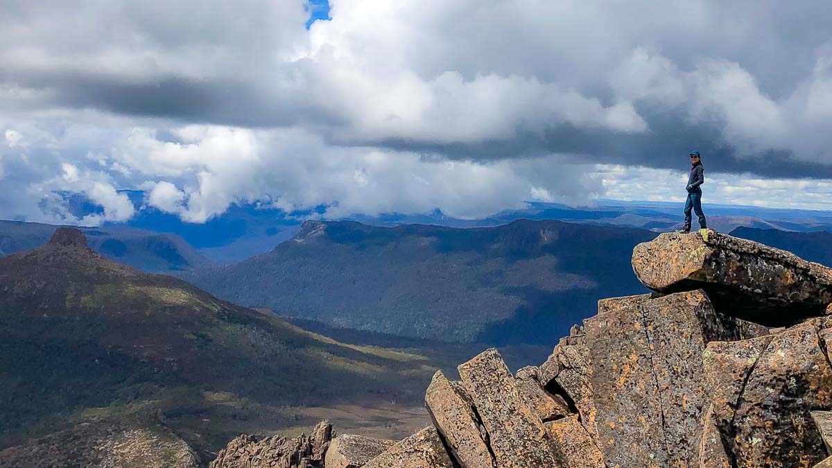 Standing at the peak of Mount Ossa - Solo Travel Guide