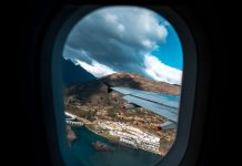 Airplane Window View - Travel Reopening Timeline