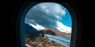 Airplane Window View - Travel Reopening Timeline