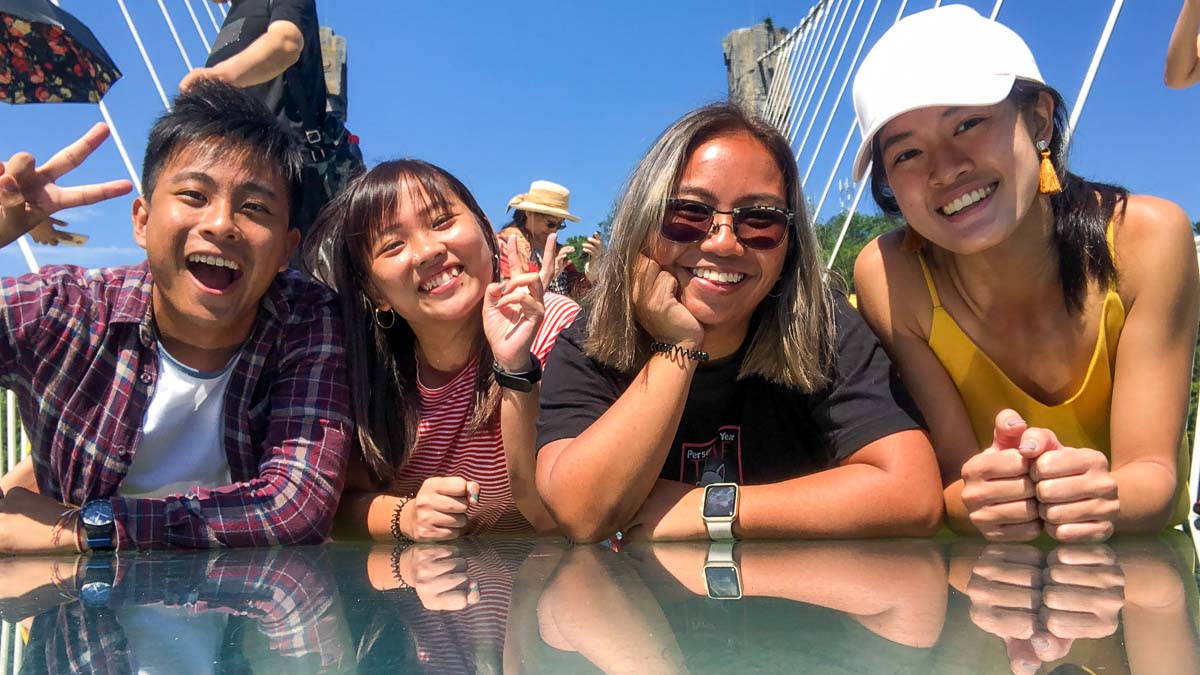 Group photo on Zhangjiajie Glass Bridge - Essential Apps for Travelling in China