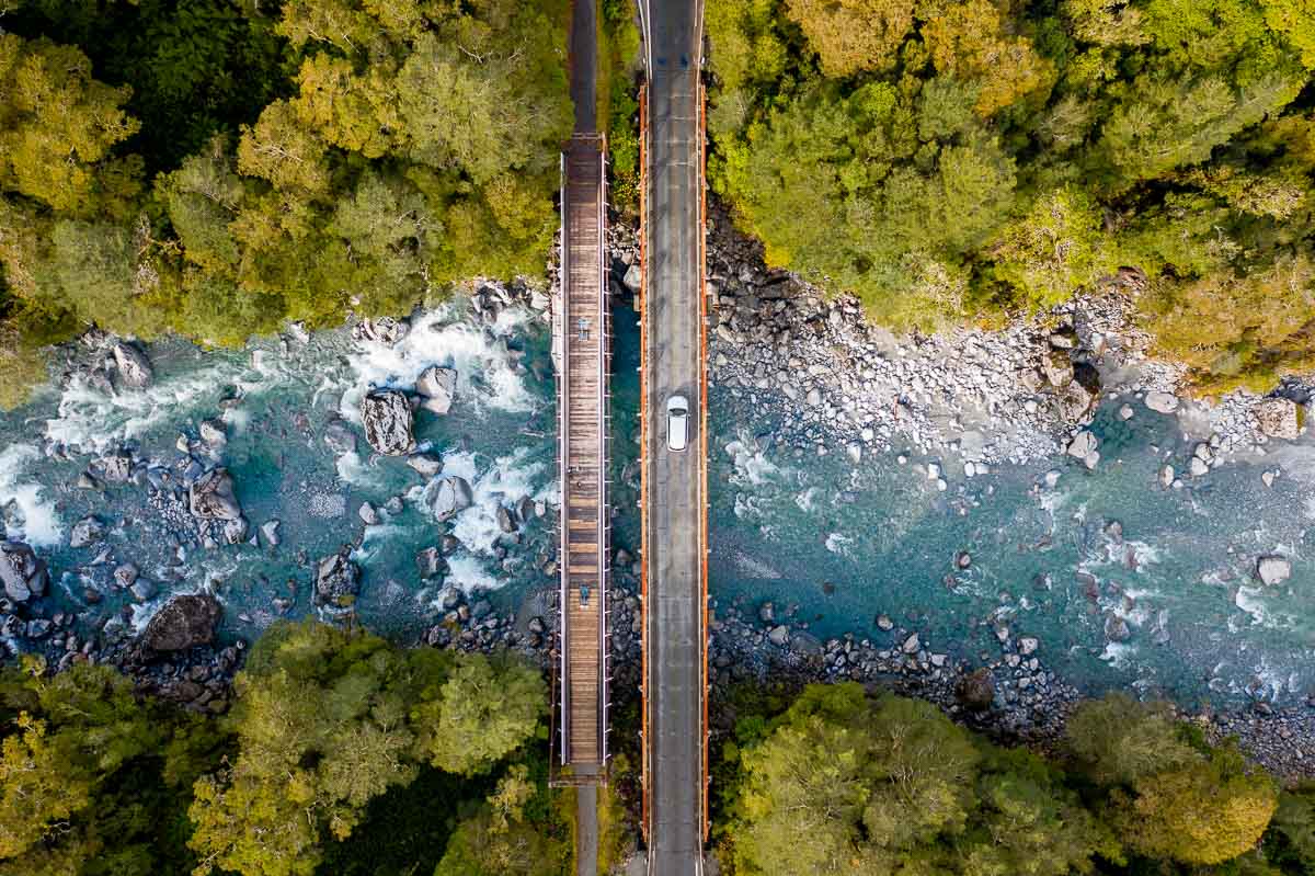 Driving through Bridge at Milford Sound, South Island - New Zealand Best Things to Do