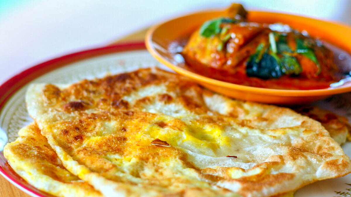 Roti Prata with Egg and Curry - Singapore Travel Guide