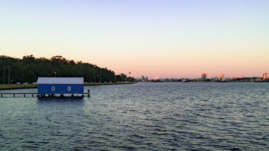 Blue house in Perth during sunset- Perth Itinerary