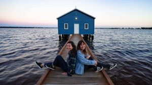 Girls in front of iconic Blue house Perth - Australia on a budget