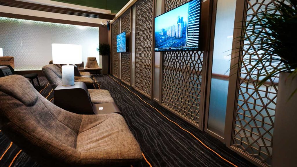 Lounge sofa and tv screen - marhaba lounge review
