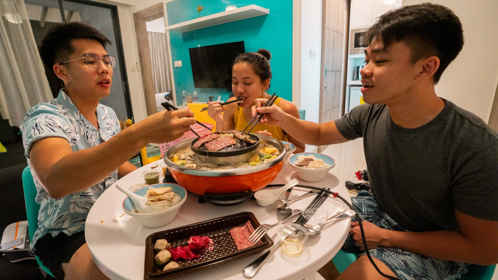 Enjoying a mookata lunch from our Cassia Bintan hotel room