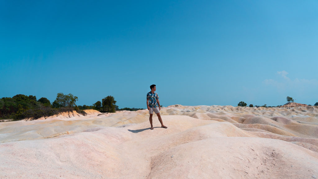 Posing atop the sand dunes at Gurun Pasir Busung - Bintan itinerary