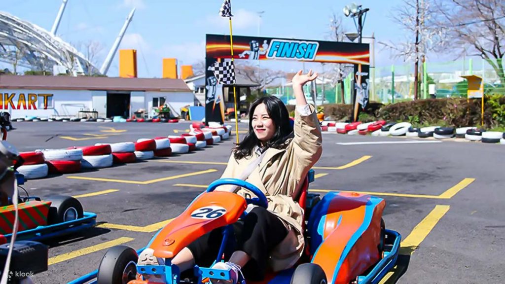 Girl cart riding at Jeju Seri - Jeju Itinerary